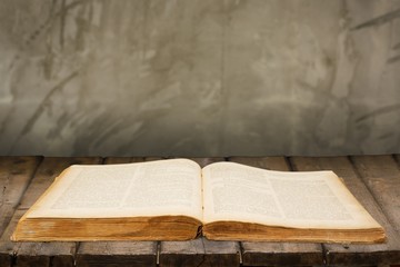 Art. Image of opened magic book with magic lights