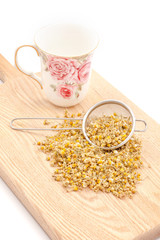 Chamomile tea Chamomile tea on the wooden table
