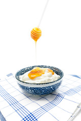 Greek yogurt with honey in a pot