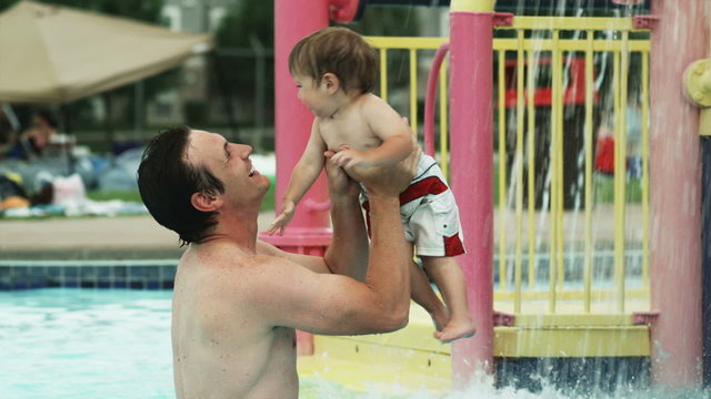 father and son at a water park