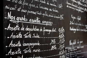 Restaurant menu in Paris France showing dishes of the day chalk board photo