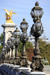 Fototapeta na wymiar Renaissance street lamps on Pont Alexandre III river seine alexander bridge Paris France