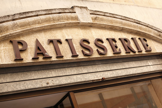 Patisserie sign over a bakery shop Paris France photo