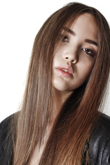 Naklejka premium Closeup girl portrait wearing leather jacket