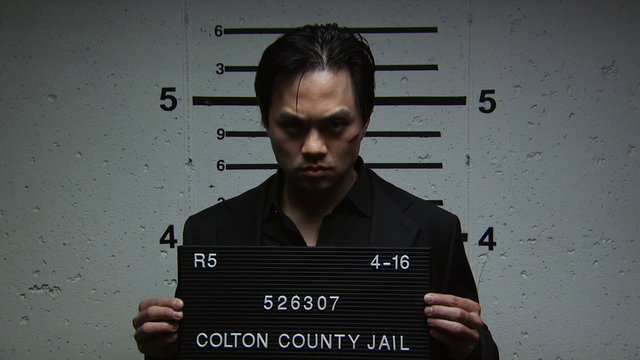 A man being booked for a crime