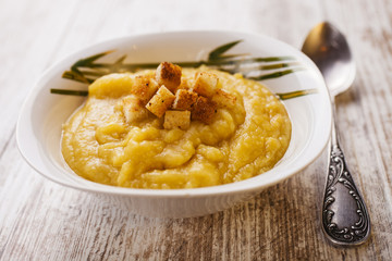 pea porridge with croutons in a plate