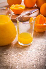 pitcher glass with juice of oranges food and drink concept