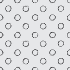 Seamless hand-drawn polka dot pattern.