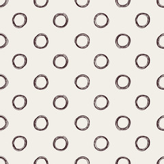 Seamless hand-drawn polka dot pattern.