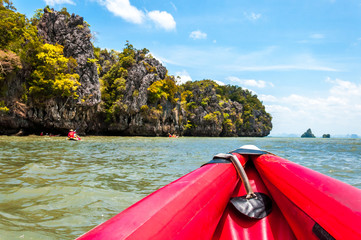 Canoeing along the crag and rocks in Phang nga bay, Thailand