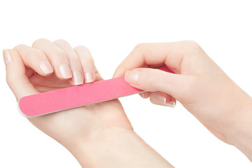 Woman hands manicure with nail file on white, clipping path