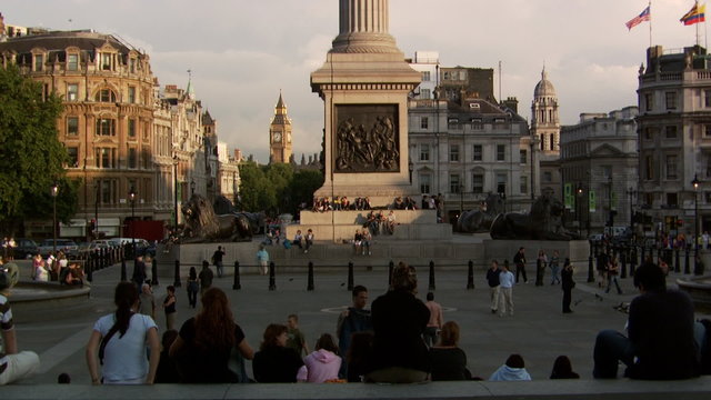Slow pan of Trafalgar Square and the bottom of Nelson's Column