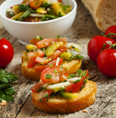 Italian bruschetta with tomato, onion and bell petsem, sample fo