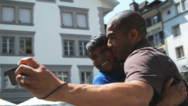 couple taking a photo of themselves