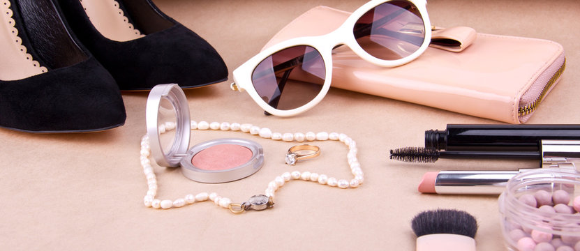 beautiful set of women's fashion accessories and cosmetics