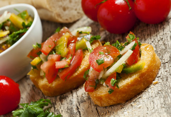 Italian bruschetta with tomato, onion and bell petsem, sample fo