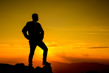 Businessman look and watch to target