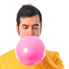 Man with pink balloon