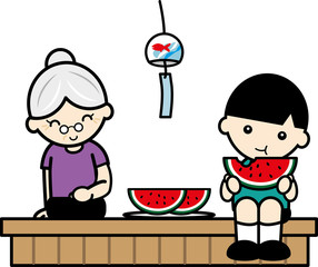 縁側ですいかを食べる男の子おばあさん