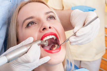 Dental drilling procedure on perfect teeth