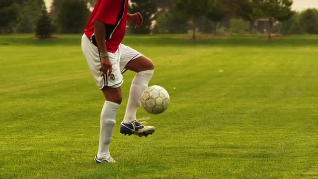 SLO MO MS TU Soccer player dribbling ball on  field, Orem, Utah, USA