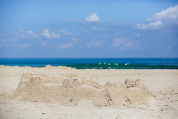 Sand castle on a sandy beach