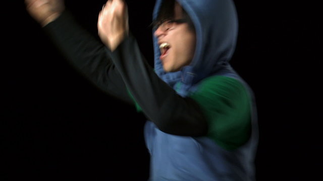Man with eyeglasses dancing