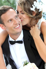 bride kissing her groom