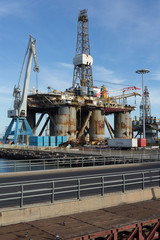 Fototapeta na wymiar Shipyard - dock / cargo harbor with container trucks