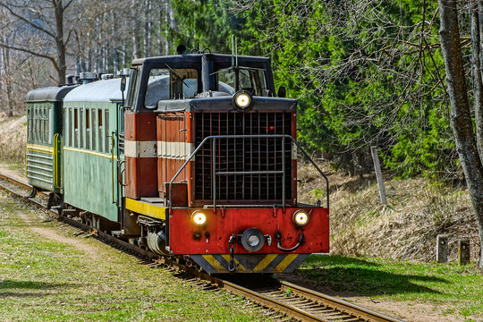 Passenger train on old narrow-gauge railway.