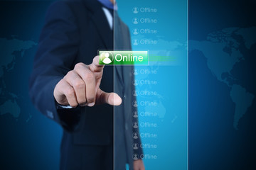 Businessman pressing virtual buttons