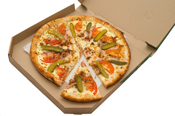 Pizza with vegetables and ham in a box