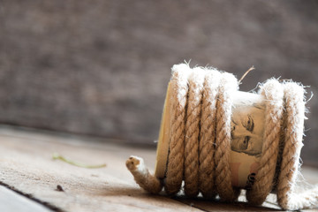 Fifty Dollar Bills and rope