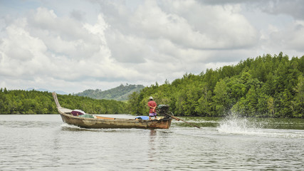 fisherman on the boat at Nakhon Si Thammarat Province Thailand