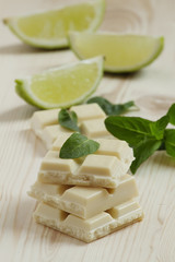 White chocolate with mint and lime, selective focus