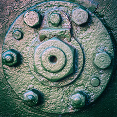 Texture of tank with screws, bolts and nuts