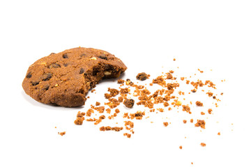 Α bitten cookie with crumbs, isolated on white - obrazy, fototapety, plakaty