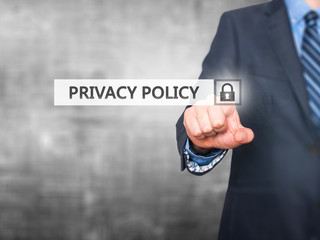 Businessman pressing Privacy Policy button