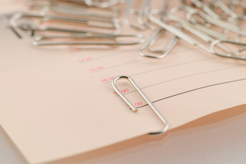 Paper clip and paper isolated