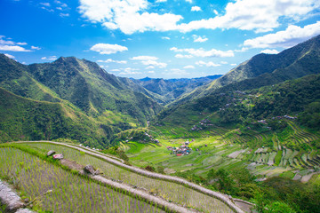 Rice terraces in the Philippines. The village is in a valley amo