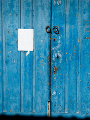 Antique blue wooden door.