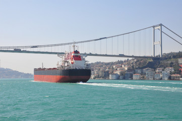 Large Cargo Tank passing the bosphorus bridge, Istanbul, Turkey