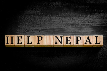 Message HELP NEPAL isolated on black background