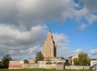Fototapeta premium Cityscape with scyscraper and clouds