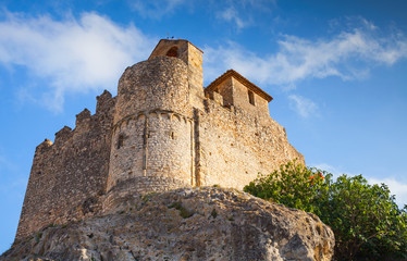 Fototapeta na wymiar Medieval stone castle on the rock in Spain
