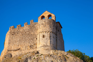 Fototapeta na wymiar Medieval stone castle on the rock in Spain