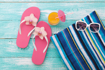 Summer Holidays. Beachwear on wooden background.