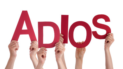 People Holding Spanish Word Adios Means Goodbye