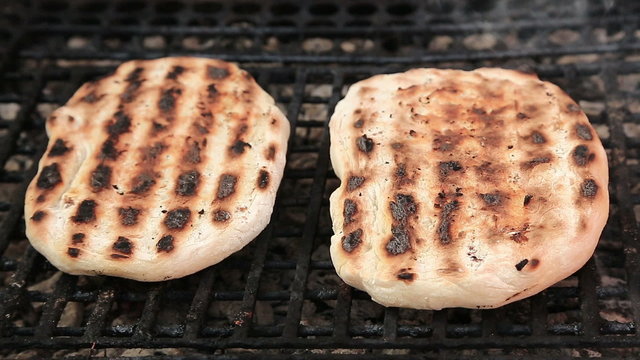 Chef arranging tortilla on barbecue grill Full HD