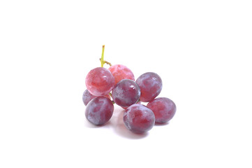 Fresh bunch of red grapes Isolated on white background.
